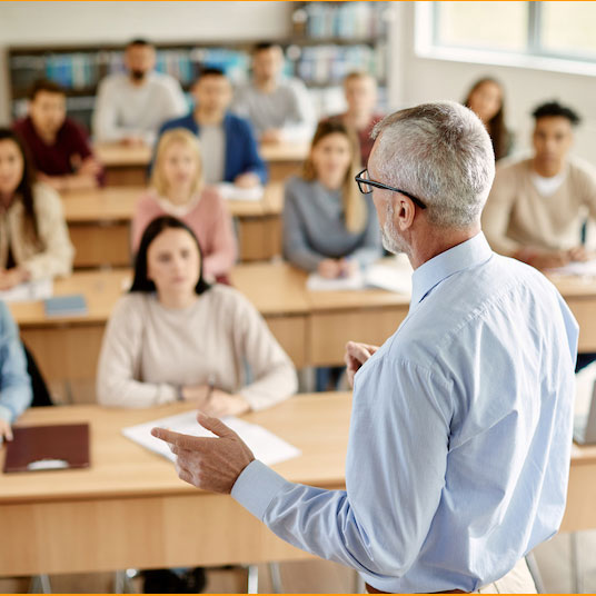 A teacher in front of a classroom